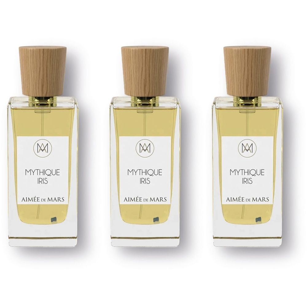 Trois flacons rectangulaires avec bouchons en bois. Étiquettes avec "MYTHIQUE IRIS" et "AIMÉE DE MARS".