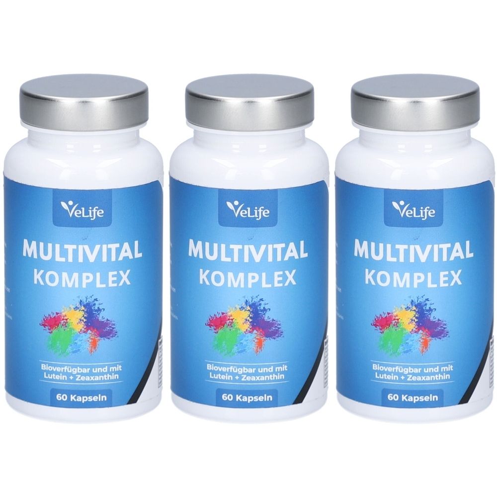 Drei Flaschen VeLife Multivital Komplex. Weiße Flaschen mit silbernen Deckeln und blauen Etiketten. Aufschrift: Multivital Komplex, 60 Kapseln.