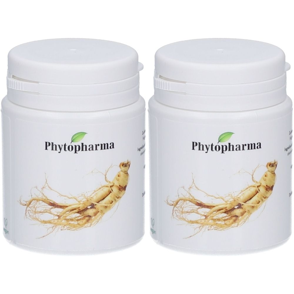 Zwei weiße Dosen mit Deckel. Auf jeder Dose steht "Phytopharma" und ein Ginseng-Wurzel-Bild. Keine weiteren Details.