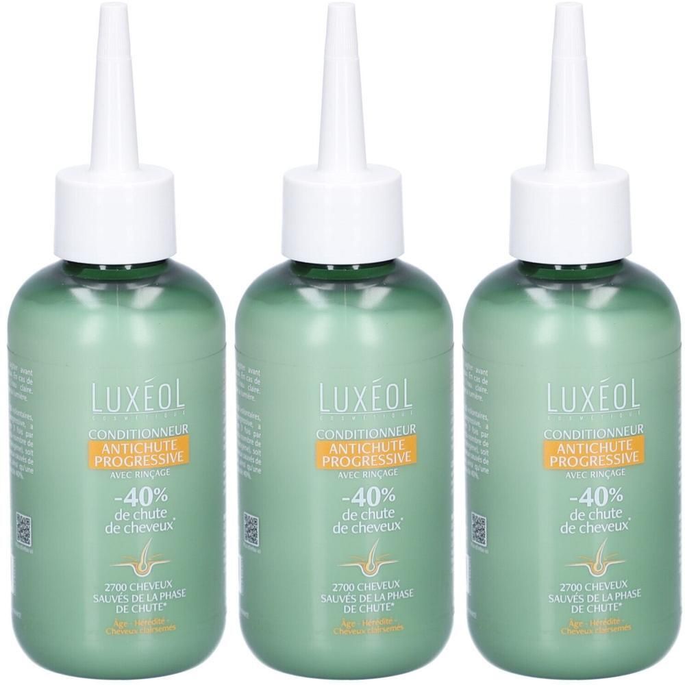 Trois flacons verts LUXÉOL Conditioner antichute progressive. Embout blanc, bande jaune avec texte. -40% de chute de cheveux.
