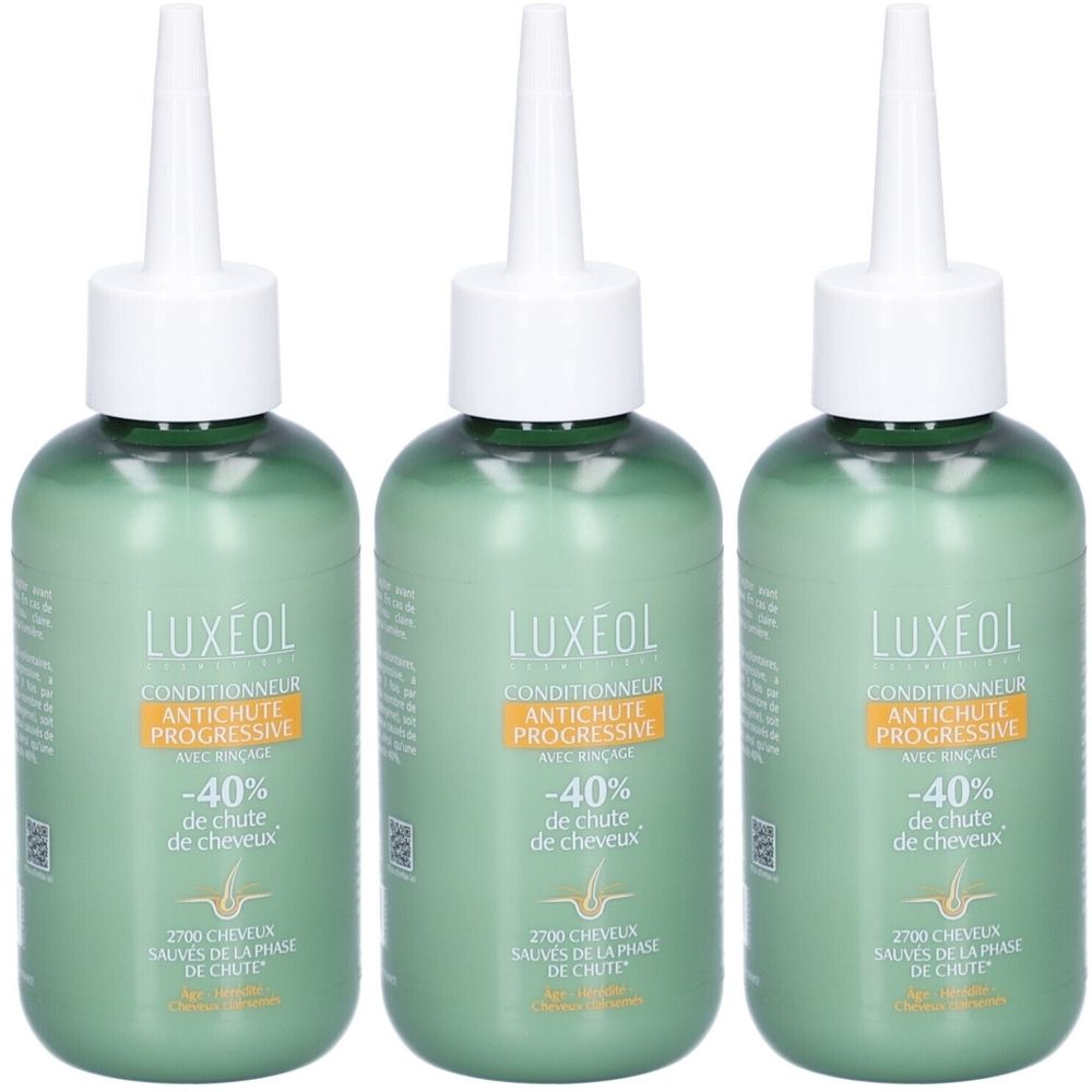 Trois flacons verts avec applicateur blanc. Inscription: LUXÉOL CONDITIONNEUR ANTICHUTE PROGRESSIVE, -40% de chute de cheveux.