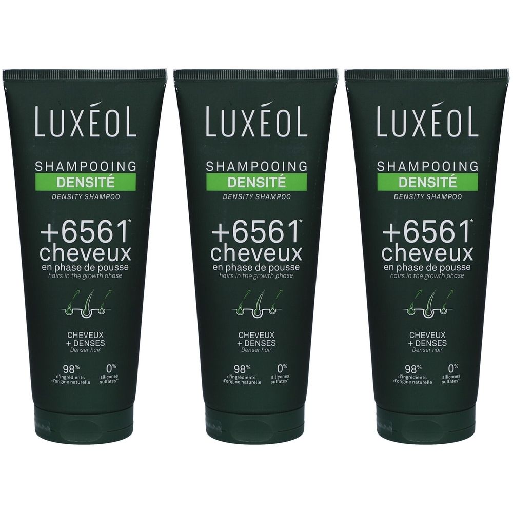 Trois tubes de shampooing Luxéol. Emballage vert foncé avec texte blanc. Inscription: Shampooing Densité, +6561 cheveux, 98% ingrédients d'origine naturelle.
