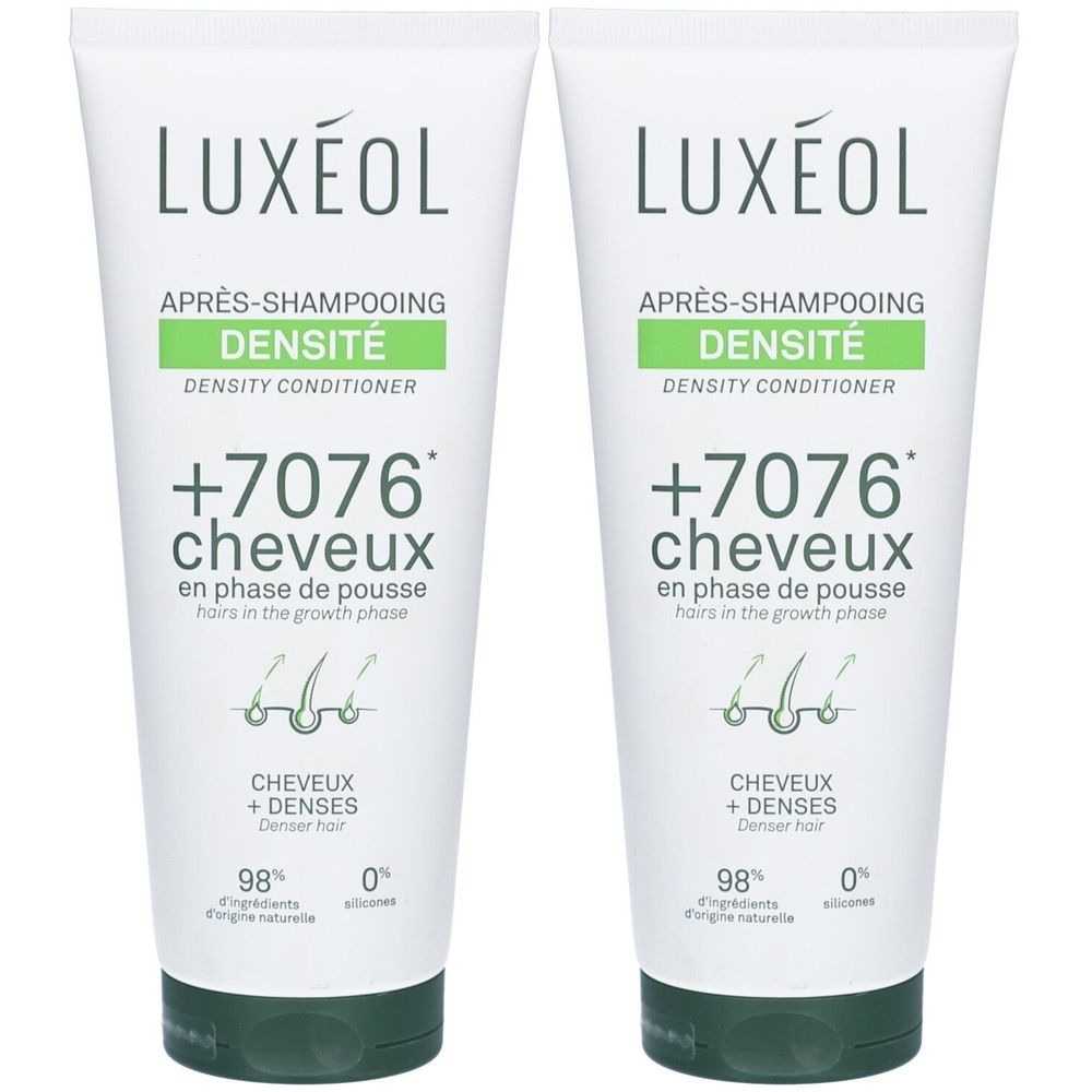 Zwei weiße Tuben LUXÉOL Conditioner. Aufschrift: Après-Shampooing Densité, +7076 cheveux, 98% Inhaltsstoffe natürlichen Ursprungs.