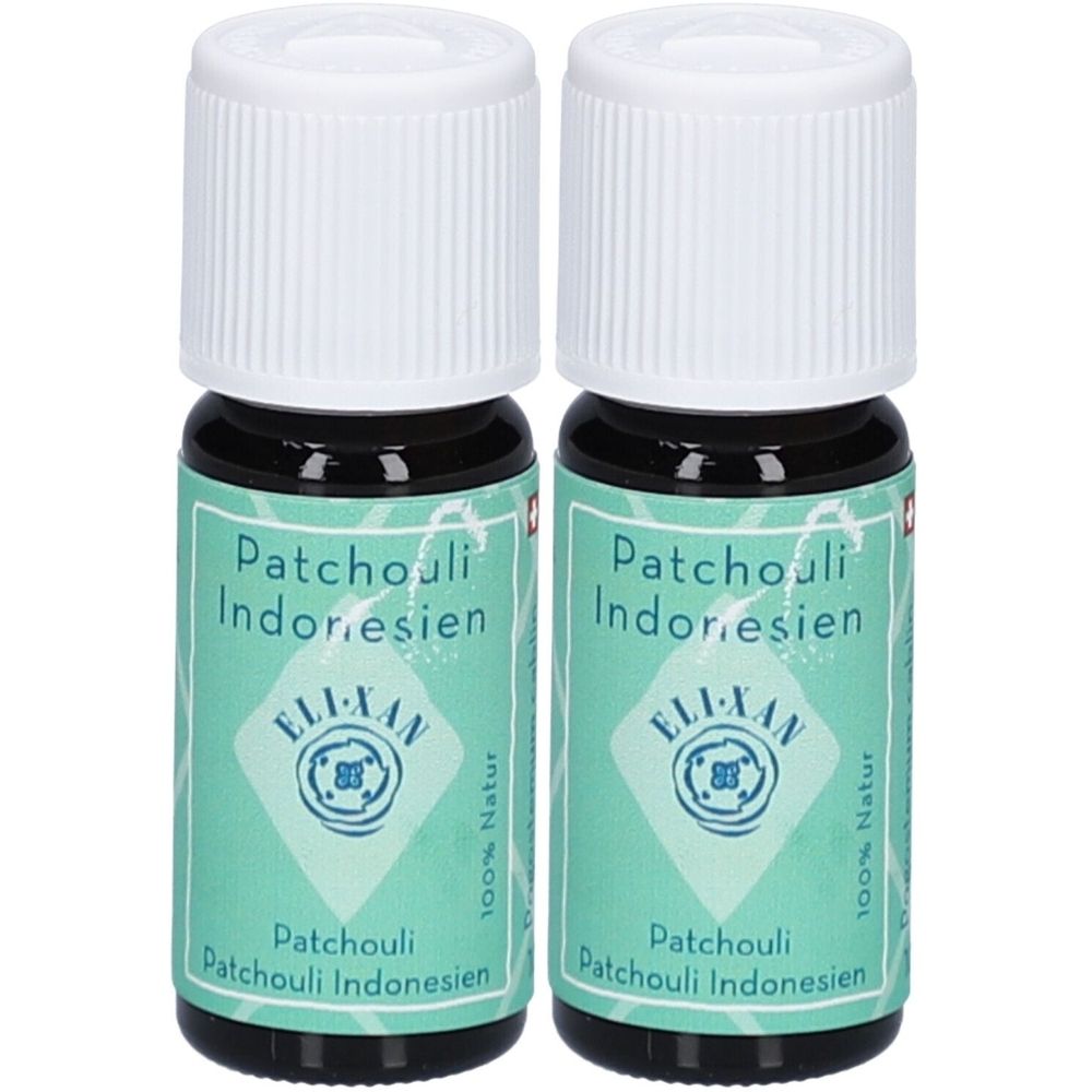 Deux flacons avec bouchons blancs. Inscription: Patchouli Indonesien, ELIXAN, 100% Natur. Étiquette turquoise.