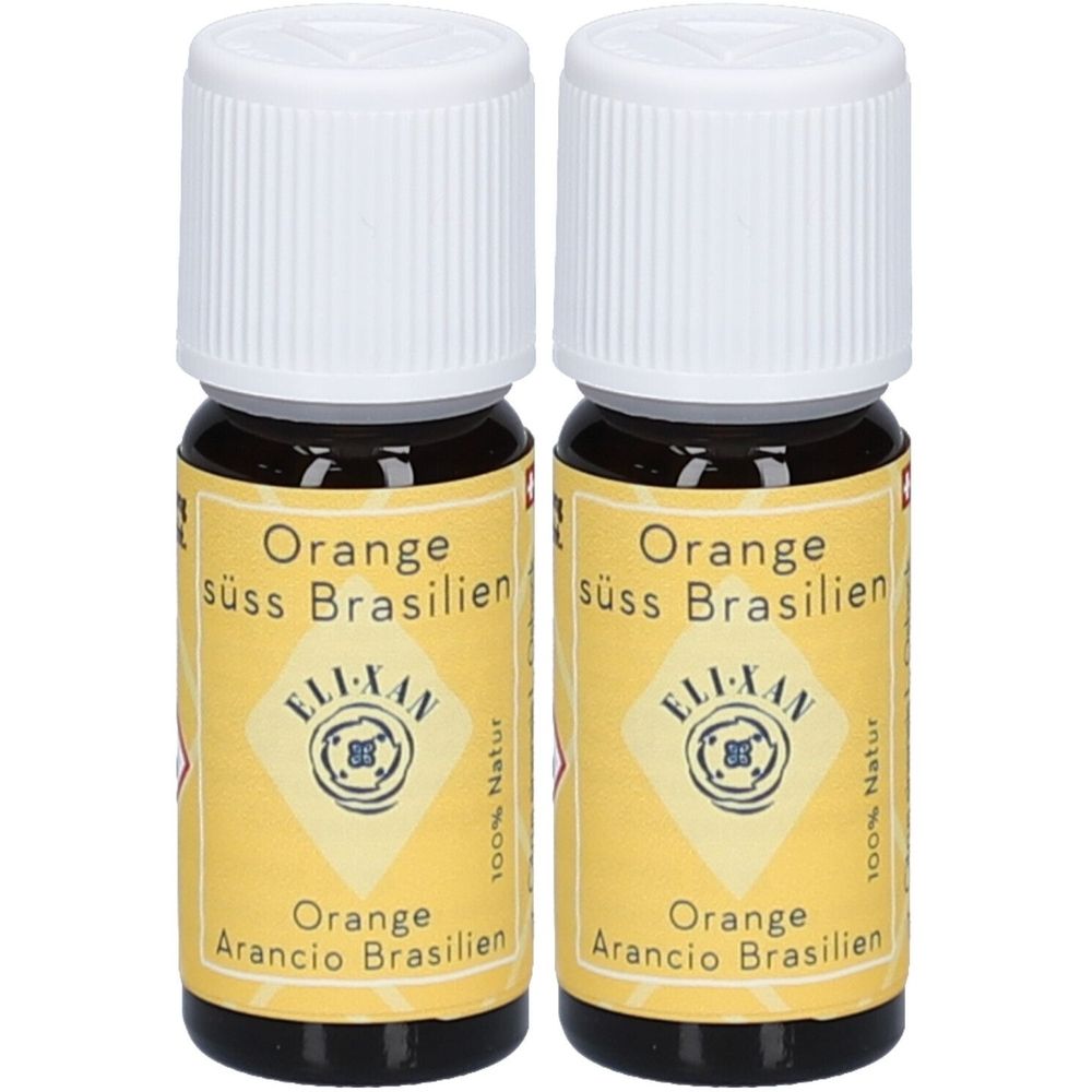 Zwei kleine Glasflaschen mit weißem Deckel. Auf gelbem Etikett steht "Orange süss Brasilien" und "ELI-XAN".