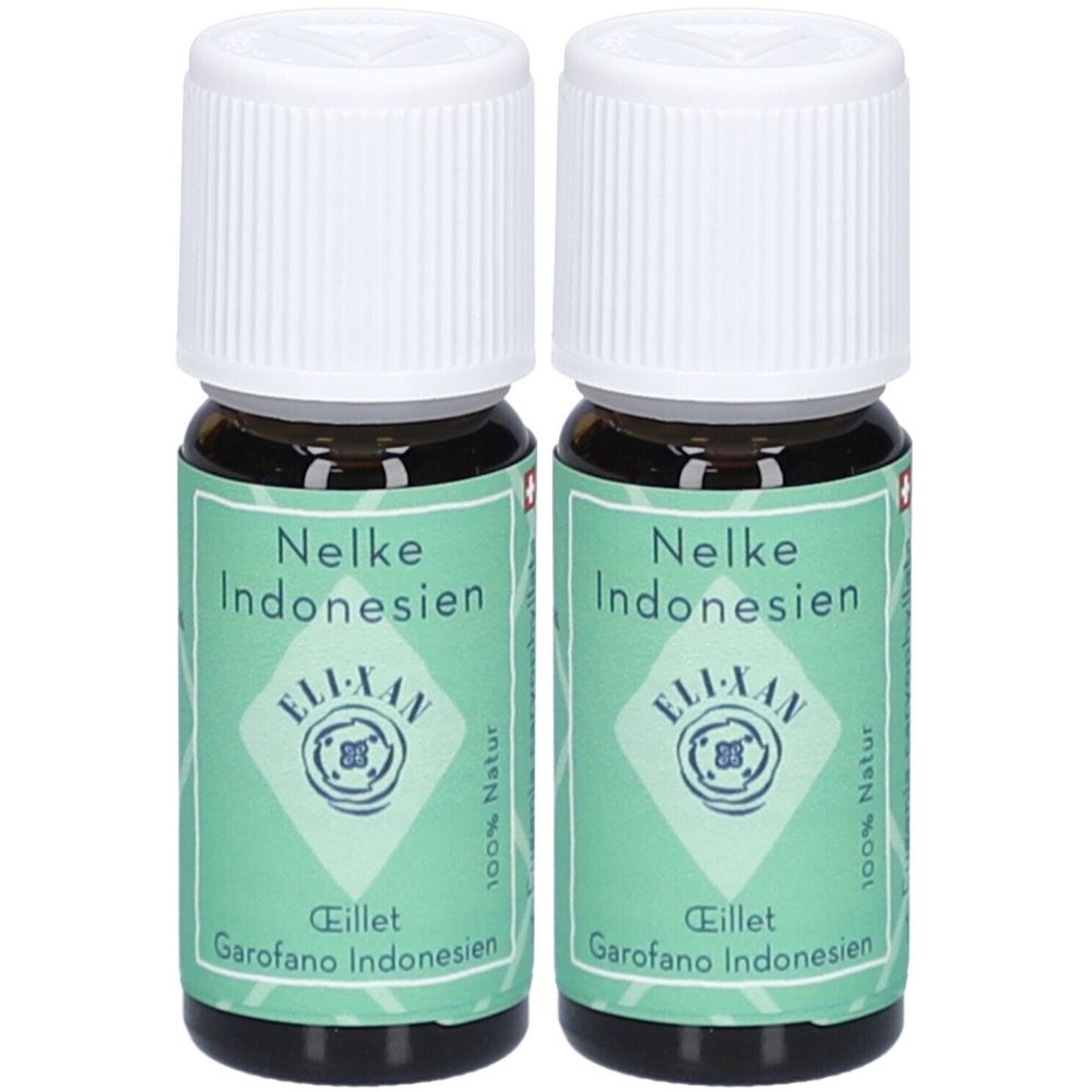 Deux petites bouteilles en verre avec bouchon à vis blanc. Étiquette avec texte : Nelke Indonesien, ELI-XAN, 100% Natur.