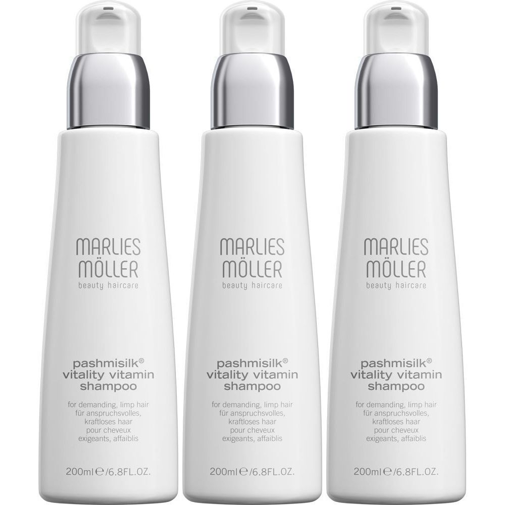 Drei weiße Flaschen mit silbernen Pumpköpfen. Auf jeder Flasche steht "Marlies Möller beauty haircare" und "pashmisilk vitality vitamin shampoo".