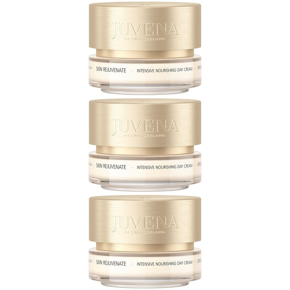 Trois pots de crème de jour. Couvercles dorés avec logo de la marque. Inscription : Skin Rejuvenate, Intensive Nourishing Day Cream.