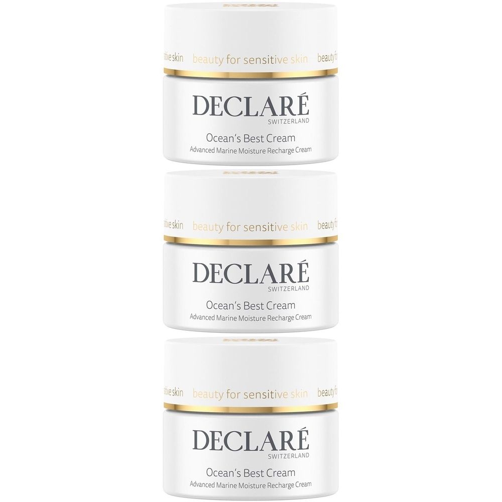 Drei weiße Tiegel mit goldfarbenen Rändern. Auf jedem steht "DECLARÉ Ocean's Best Cream".