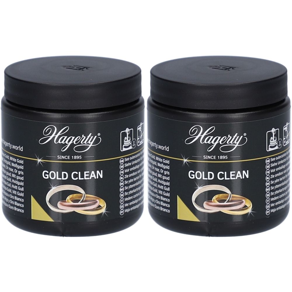 Deux pots noirs avec couvercles. Inscription : Hagerty Gold Clean. Illustration d'anneaux. Texte en plusieurs langues.