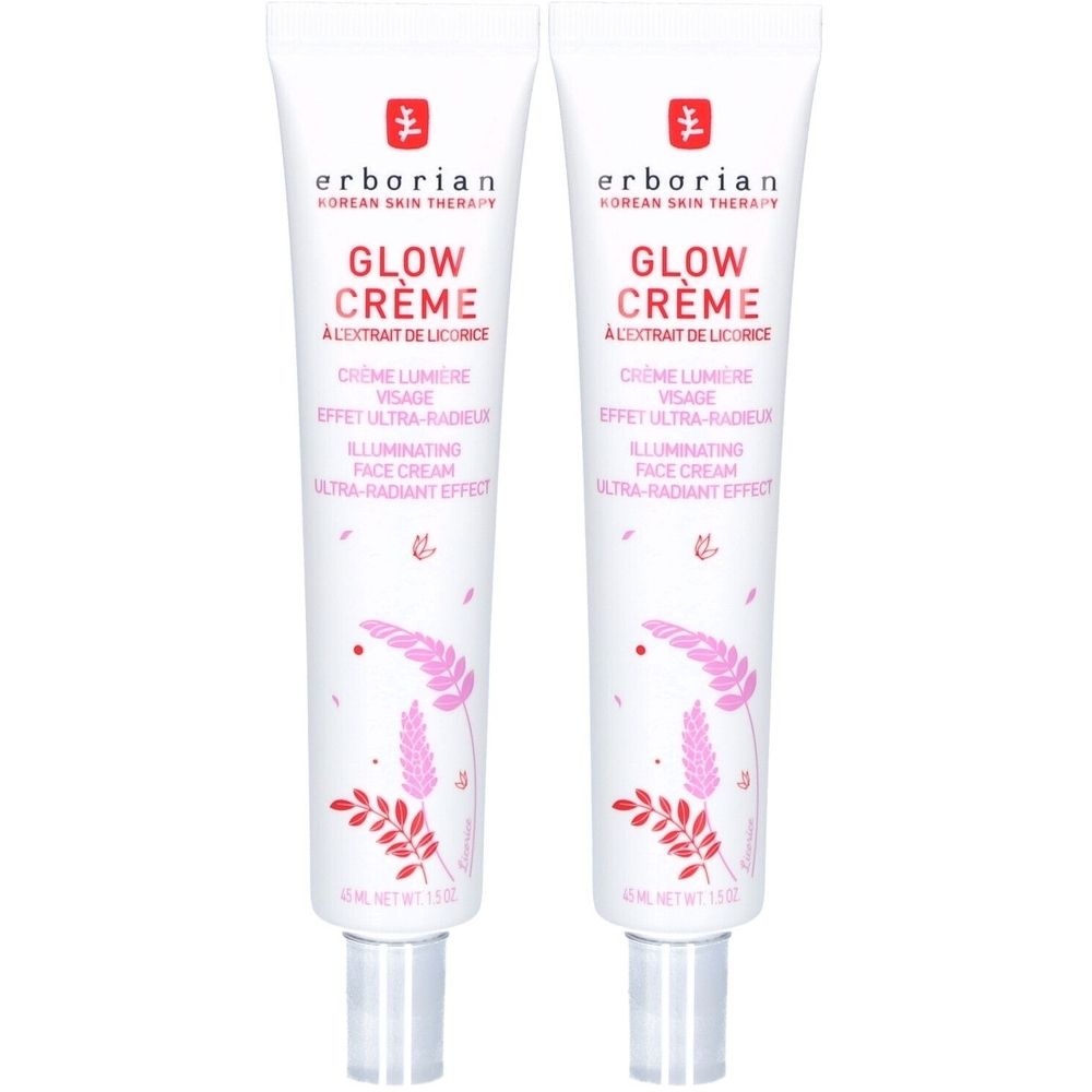 Deux tubes de crème Erborian Glow. Tubes blancs avec nom du produit et illustrations florales. Contient du texte en français et en anglais.