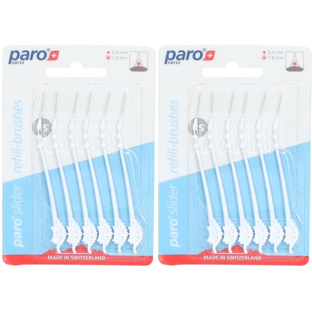 Zwei Packungen mit PARO slider refill-brushes. Jede Packung enthält sechs weiße Bürstenköpfe. Verpackung mit rotem und blauem Design.