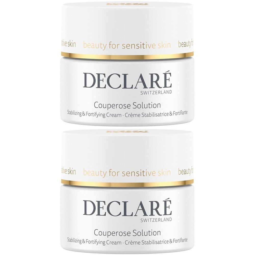 Deux pots blancs avec bordures dorées. Inscription: DECLARÉ Couperose Solution. Texte: beauty for sensitive skin. Crème stabilisatrice.