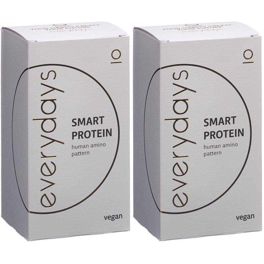 Zwei weiße Kartons mit dem Aufdruck "everydays SMART PROTEIN". Text: "human amino pattern" und "vegan". Aufdruck "10".