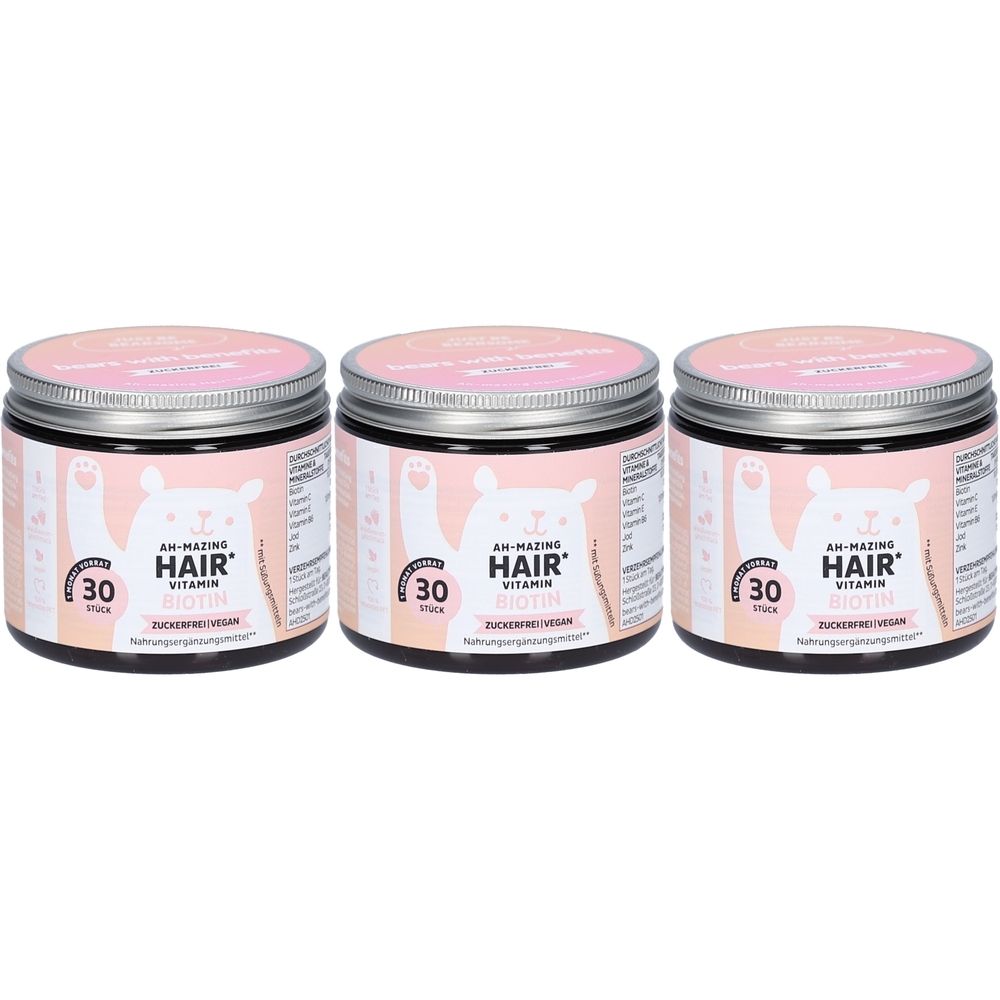 Trois pots avec couvercles roses. Chaque pot porte l'inscription "AH-MAZING HAIR VITAMIN" et "30 pièces".