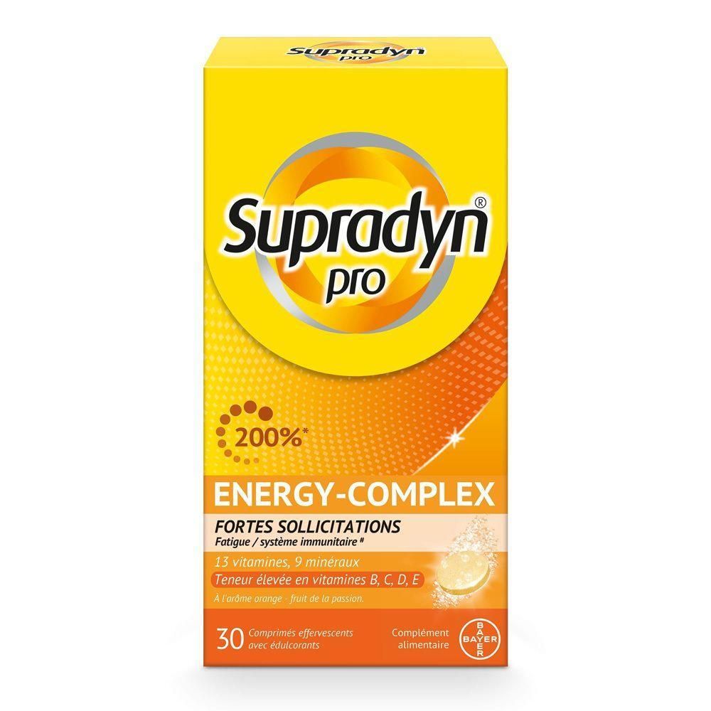 Boîte jaune "Supradyn pro Energy-Complex". Contient 30 comprimés effervescents. Texte: 13 vitamines, 9 minéraux. Logo Bayer.
