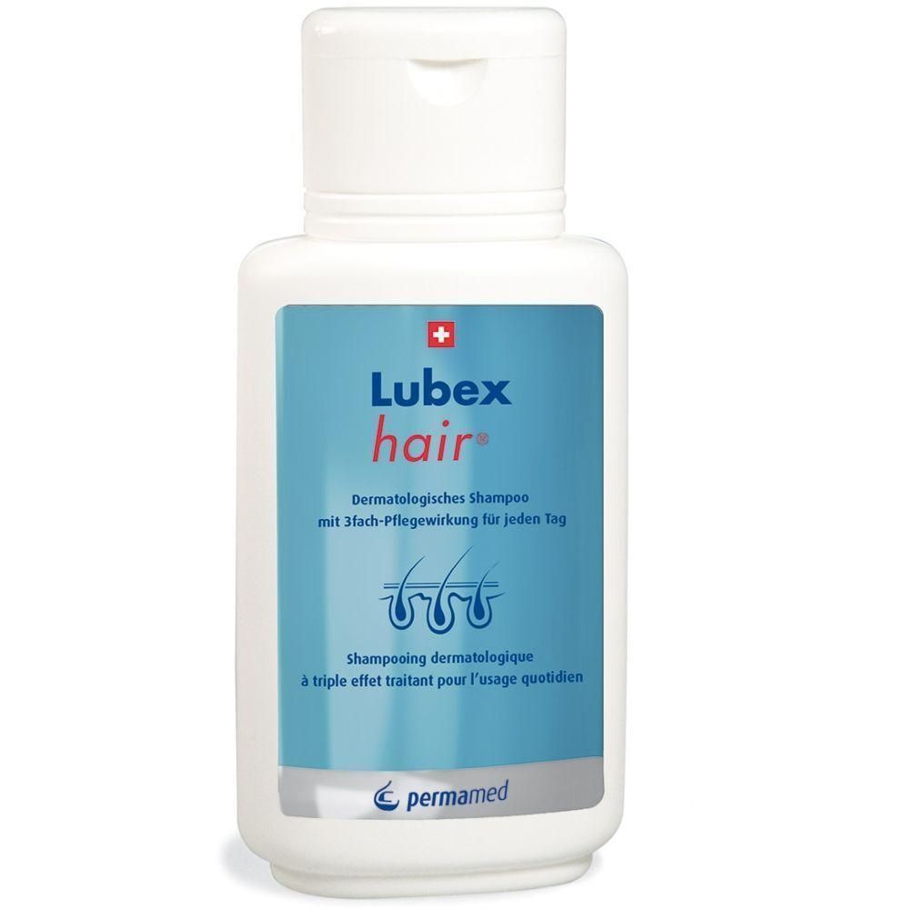 Weiße Flasche mit blauem Etikett. Aufschrift: Lubex hair, dermatologisches Shampoo. Schweizer Kreuz. Marke permamed.