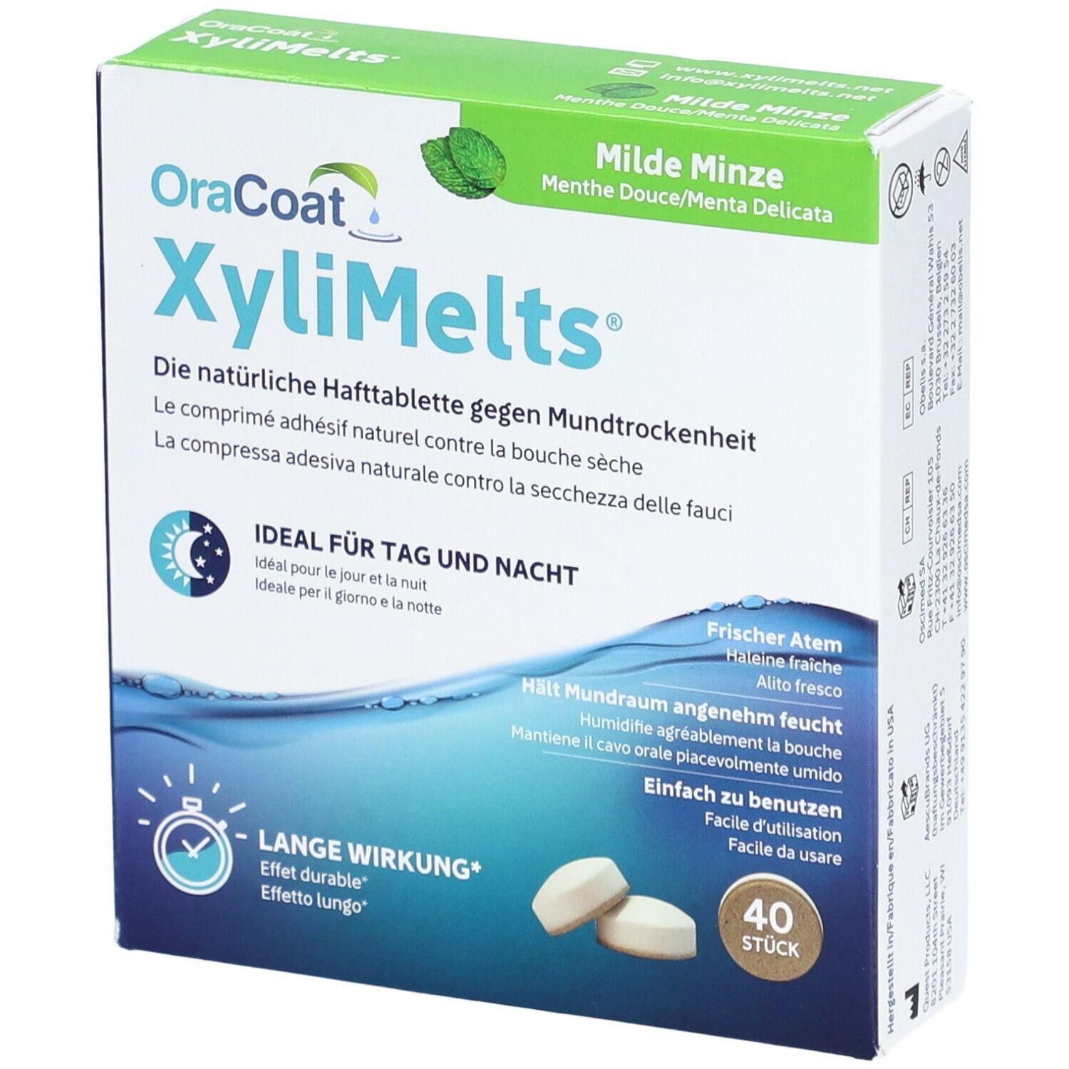 Schachtel mit OraCoat XyliMelts. Aufschrift: Milde Minze. Enthält 40 Stück. Zwei Tabletten liegen daneben.