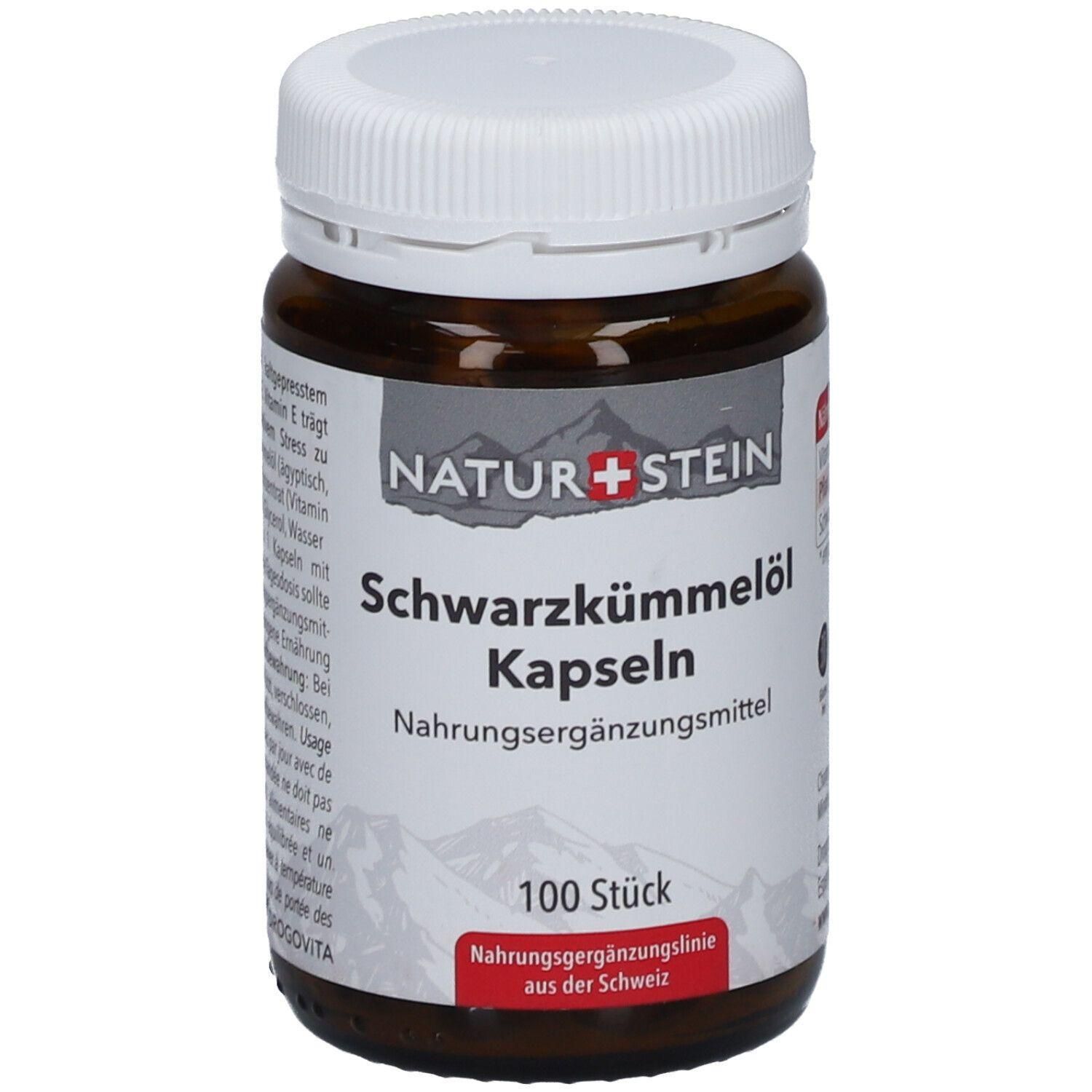 Braune Glasflasche mit weißem Deckel. Etikett mit "NATUR+STEIN Schwarzkümmelöl Kapseln". 100 Stück. Nahrungsergänzungsmittel.