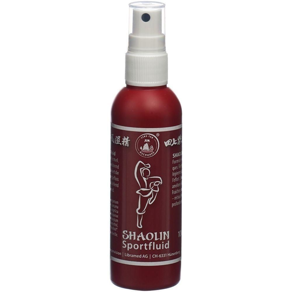 Flacon pulvérisateur rouge avec tête blanche. Inscription SHAOLIN Sportfluid. Logo avec figure. Texte en allemand et chinois.