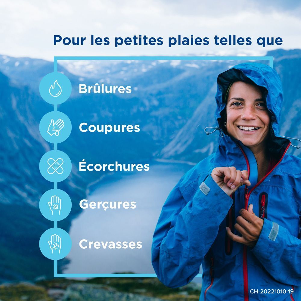 Frau in blauer Jacke. Text: Für kleine Wunden wie Verbrennungen, Schnitte, Schürfungen, Risse, Risse.