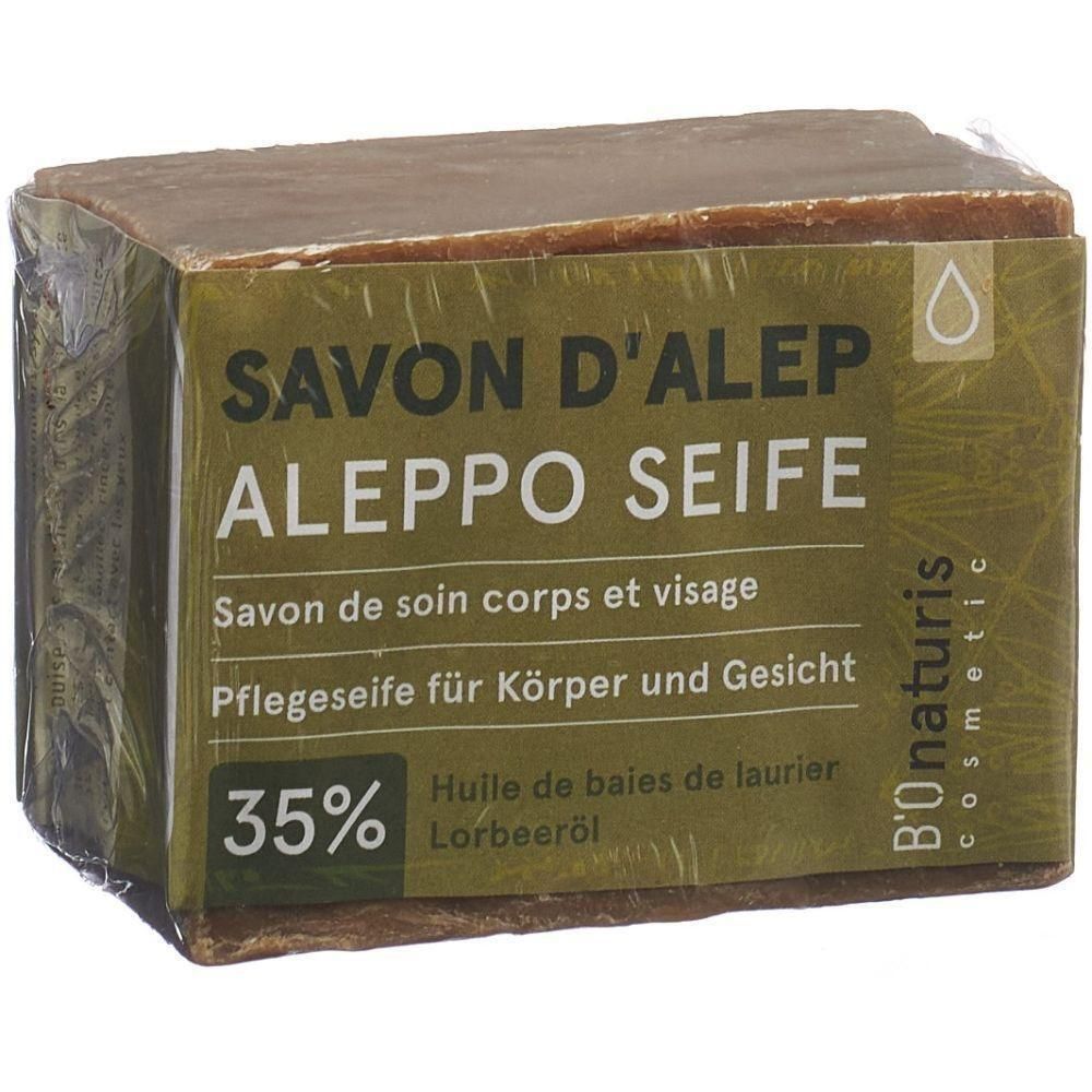 Rechteckige Seife in Folie verpackt. Aufschrift: SAVON D'ALEP, ALEPPO SEIFE, 35%. Text: Savon de soin corps et visage, Pflegeseife für Körper und Gesicht.