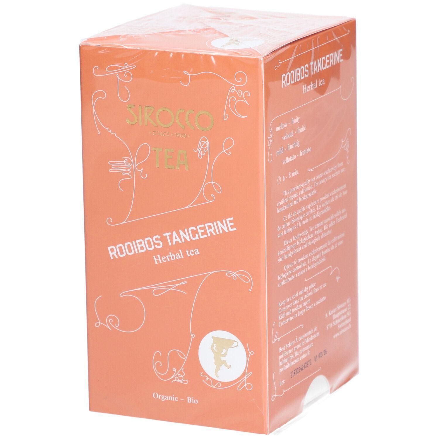Boîte de thé orange. Inscription : SIROCCO TEA, ROOIBOS TANGERINE, Herbal tea. Avec logo et textes sur l'emballage.