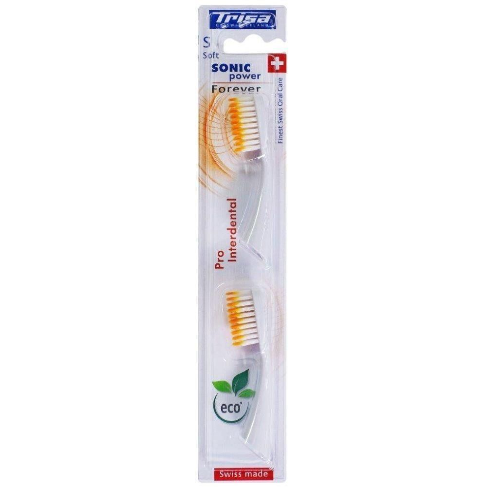 Zahnbürsten-Ersatz in Verpackung. Transparentes Gehäuse mit zwei Bürstenköpfen. Aufschrift: Trisa, Sonic Power, Interdental, Swiss Made.