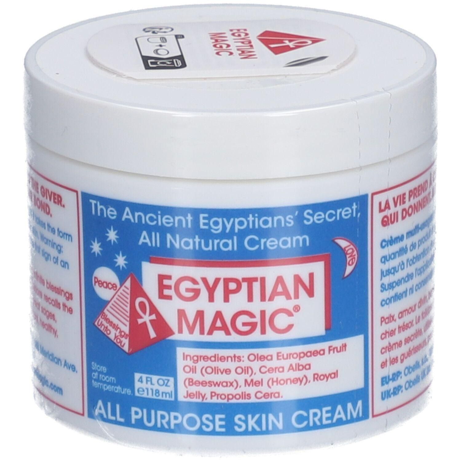 Pot blanc avec texte bleu et rouge. Inscription: Egyptian Magic All-in-One Creme. Liste des ingrédients et indication du volume.