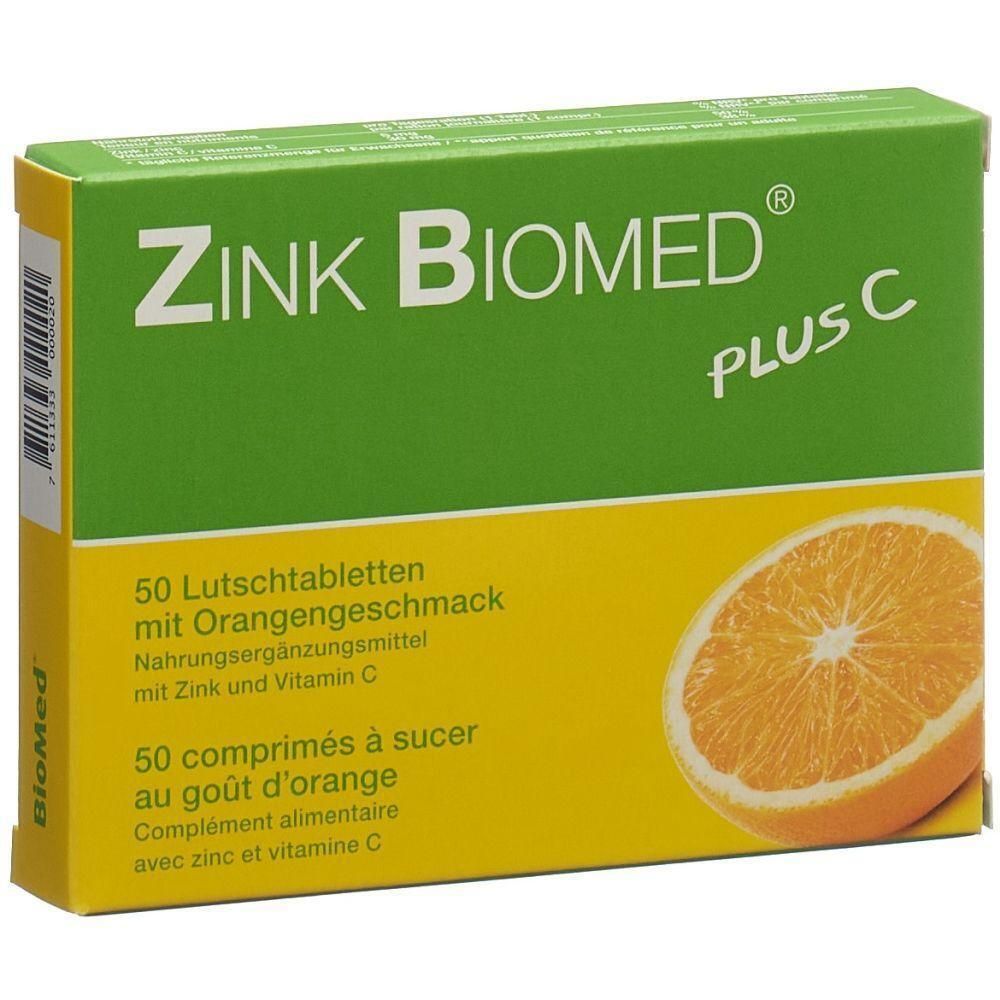Schachtel mit Zink Biomed Plus C Lutschtabletten. Grün-gelbe Verpackung mit Orangenabbildung und Produktbezeichnung.