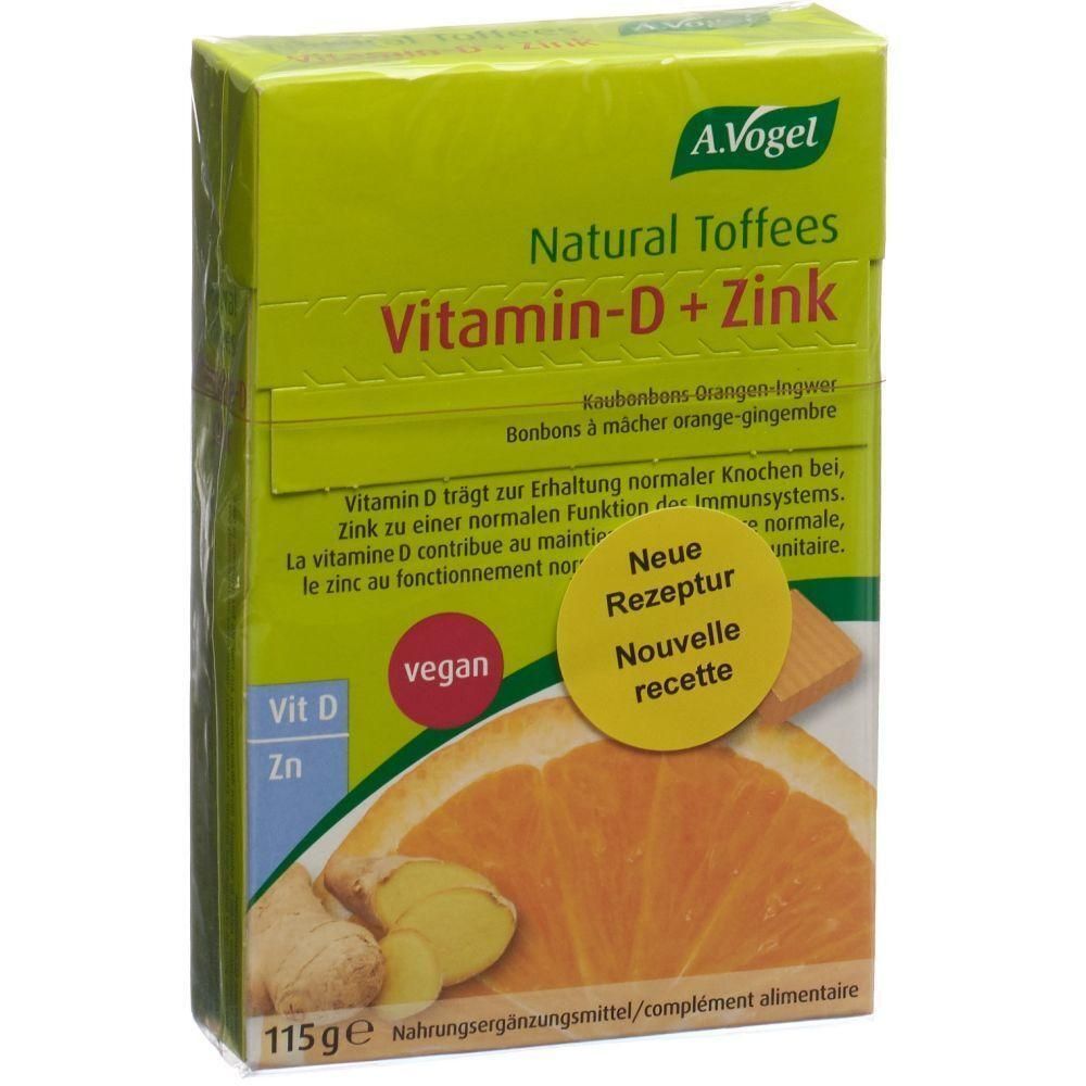 Grüne Schachtel mit Aufschrift Vitamin-D + Zink. Enthält Bonbons. Vegan. Mit Orange und Ingwer-Abbildung. 115g.