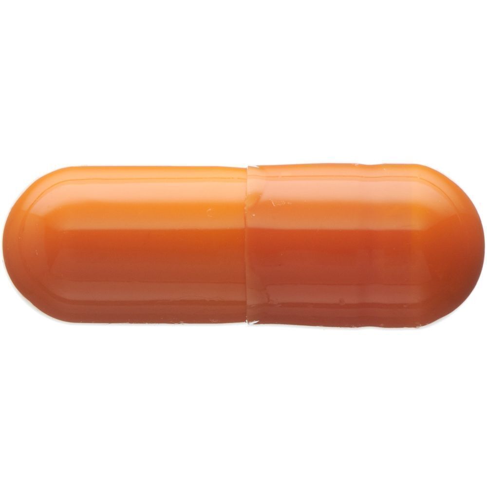 Eine orangefarbene Kapsel, zweiteilig, zylindrisch mit abgerundeten Enden. Die Kapsel ist durchscheinend.