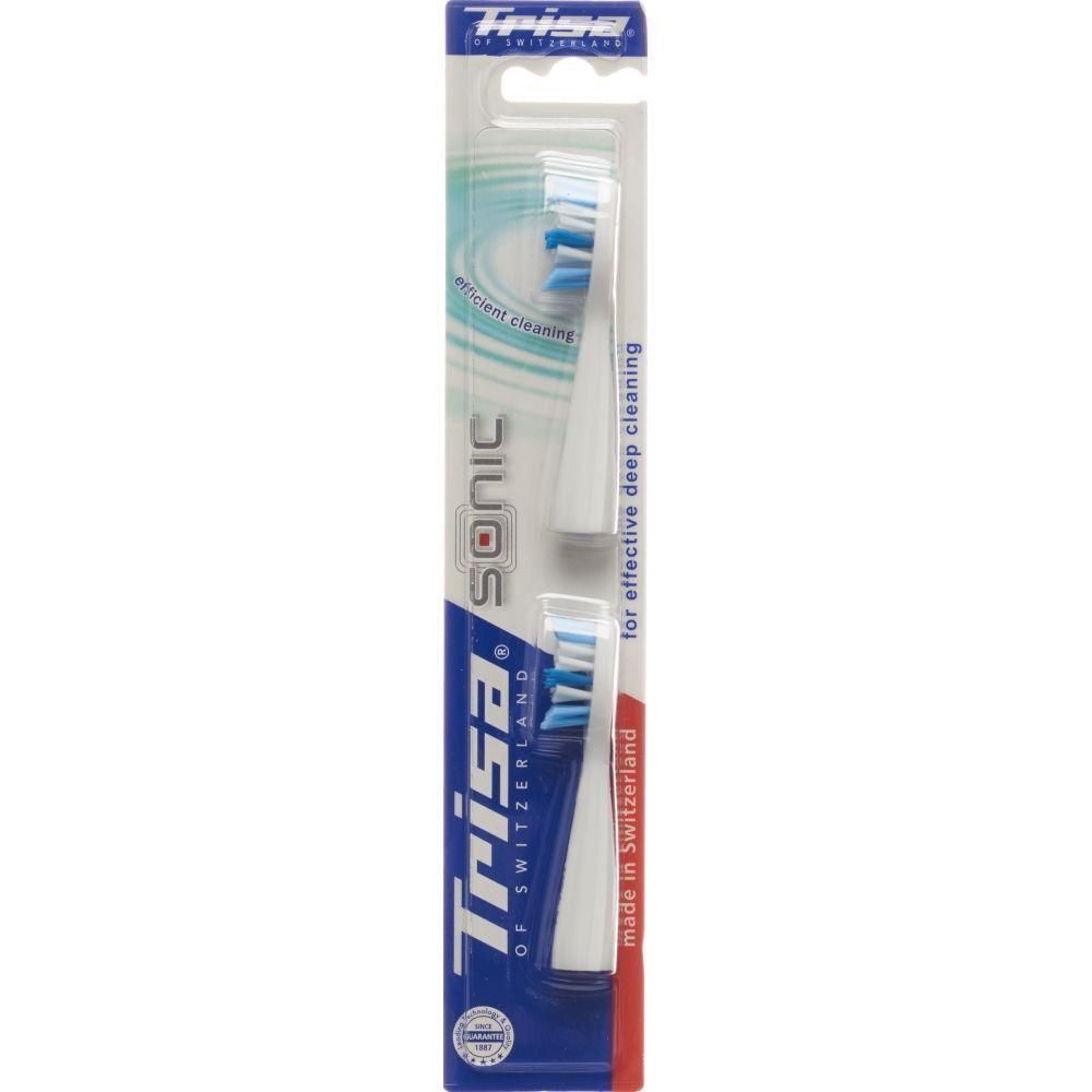 Deux têtes de brosse blanches avec des poils bleus, emballées dans une carte blister. Inscription : Trisa Sonic, fabriqué en Suisse.