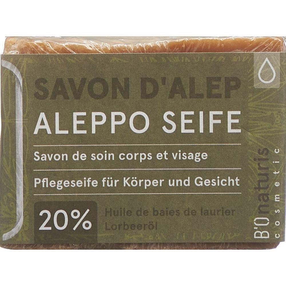 Seife in Folie verpackt. Aufschrift: SAVON D'ALEP ALEPPO SEIFE. Pflege für Körper und Gesicht. 20% Lorbeeröl. Marke B'Onaturis.
