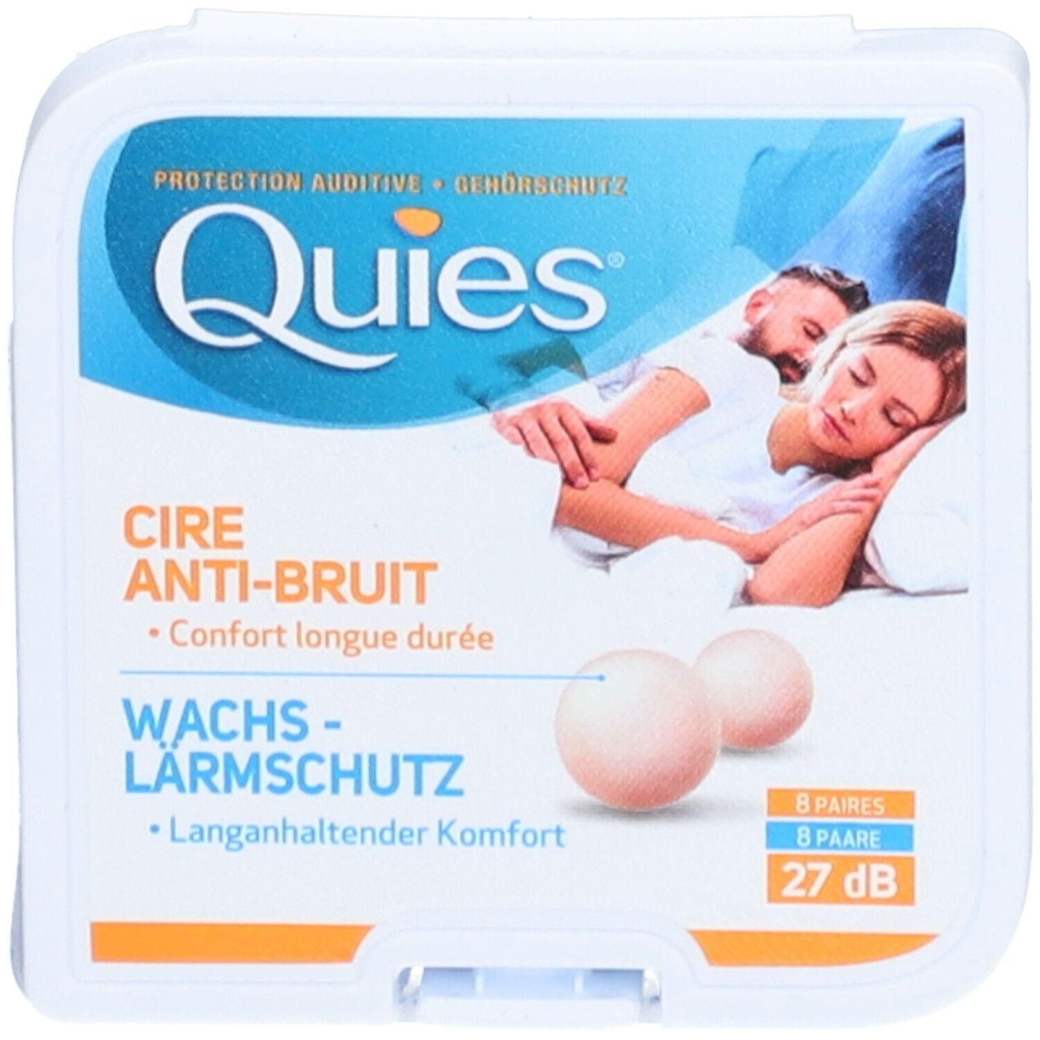 Verpackung mit zwei Ohrenschutzkugeln aus Wachs. Aufschrift: Quies, Cire Anti-Bruit, Wachs-Lärmschutz. 8 Paare, 27 dB.