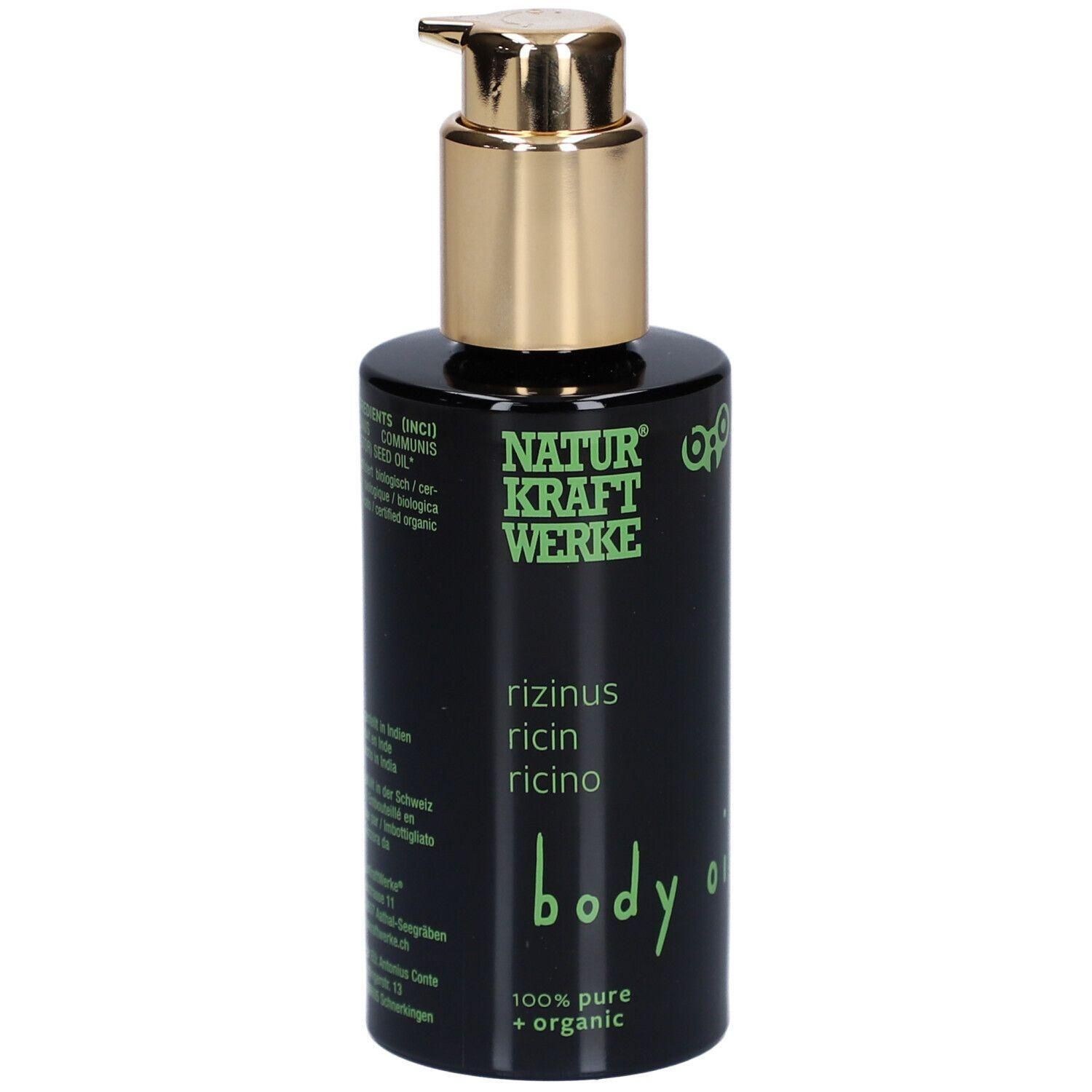 Flacon noir avec pompe dorée. Inscription : NATUR KRAFT WERKE, Rizinus, Body Oil, 100% pure + organic.