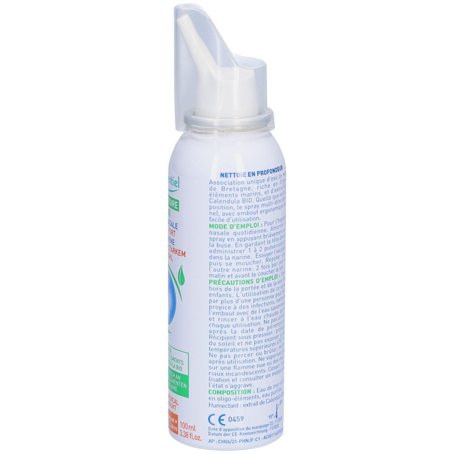 Flacon spray blanc avec embout transparent. Étiquettes bleues et vertes avec texte. Marquage CE.