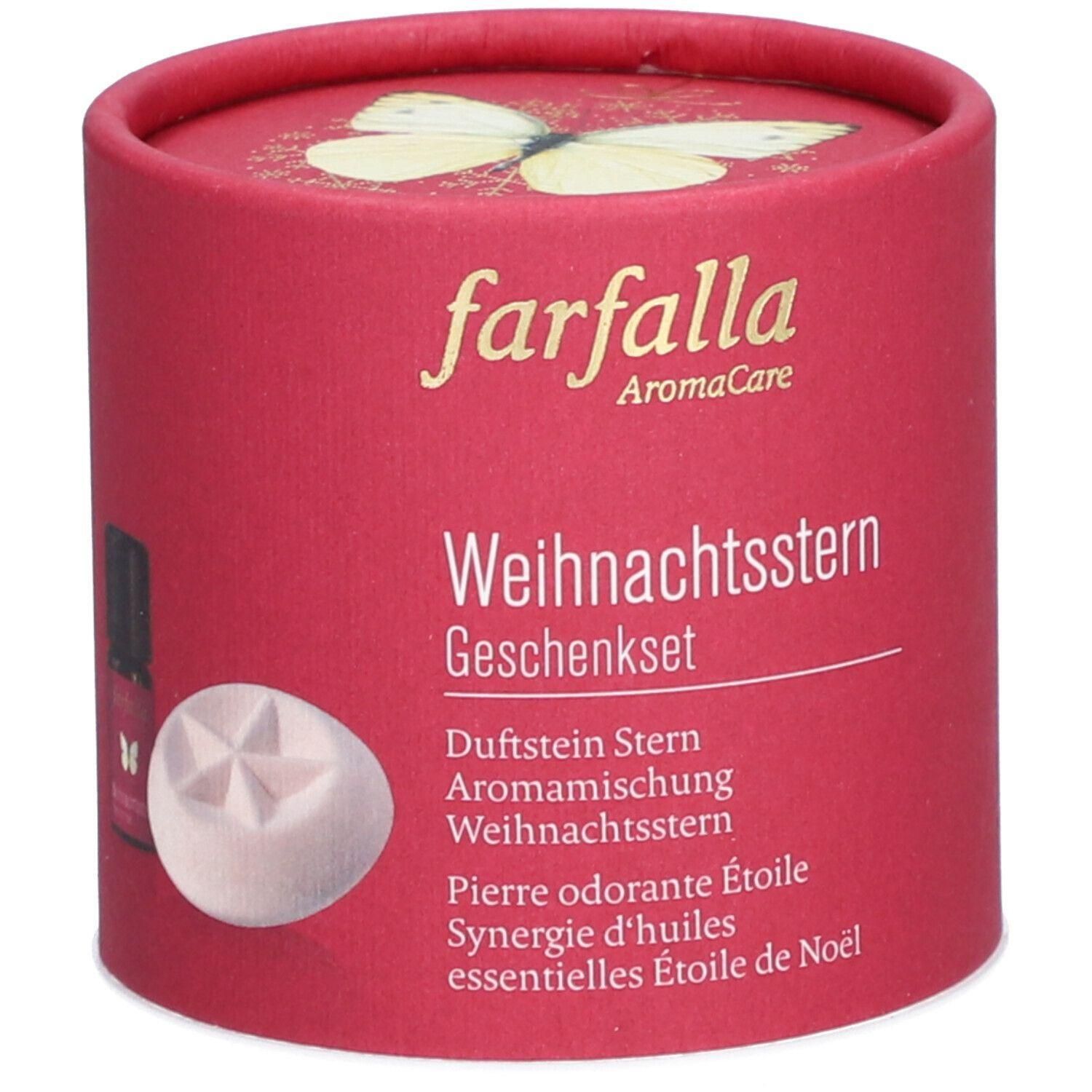 Runde, rote Geschenkverpackung mit Produktnamen und Text. Enthält Duftstein, ätherische Öle. Oben Schmetterling.