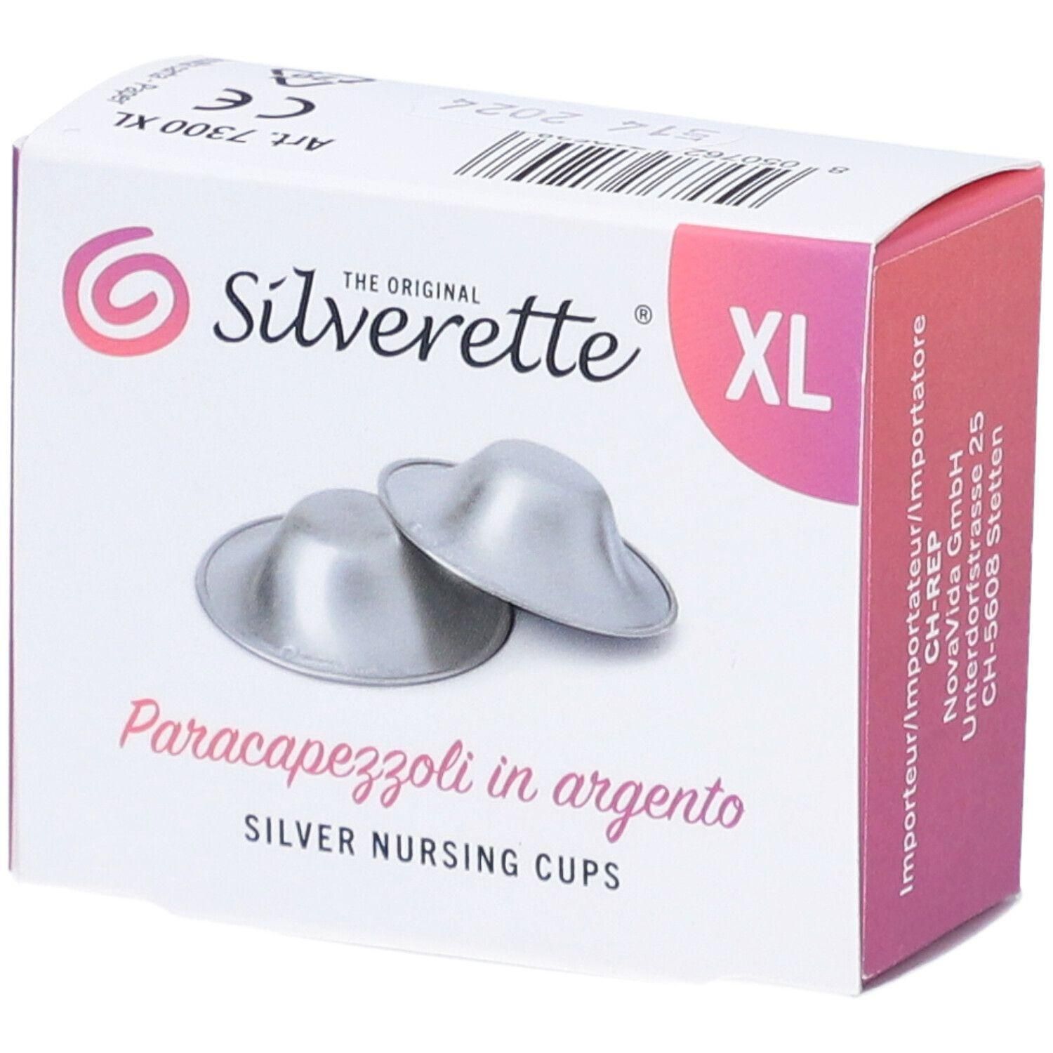 Verpackung mit zwei silberfarbenen Stillhütchen. Aufschrift: Silverette XL, Paracapezzoli in argento, SILVER NURSING CUPS.