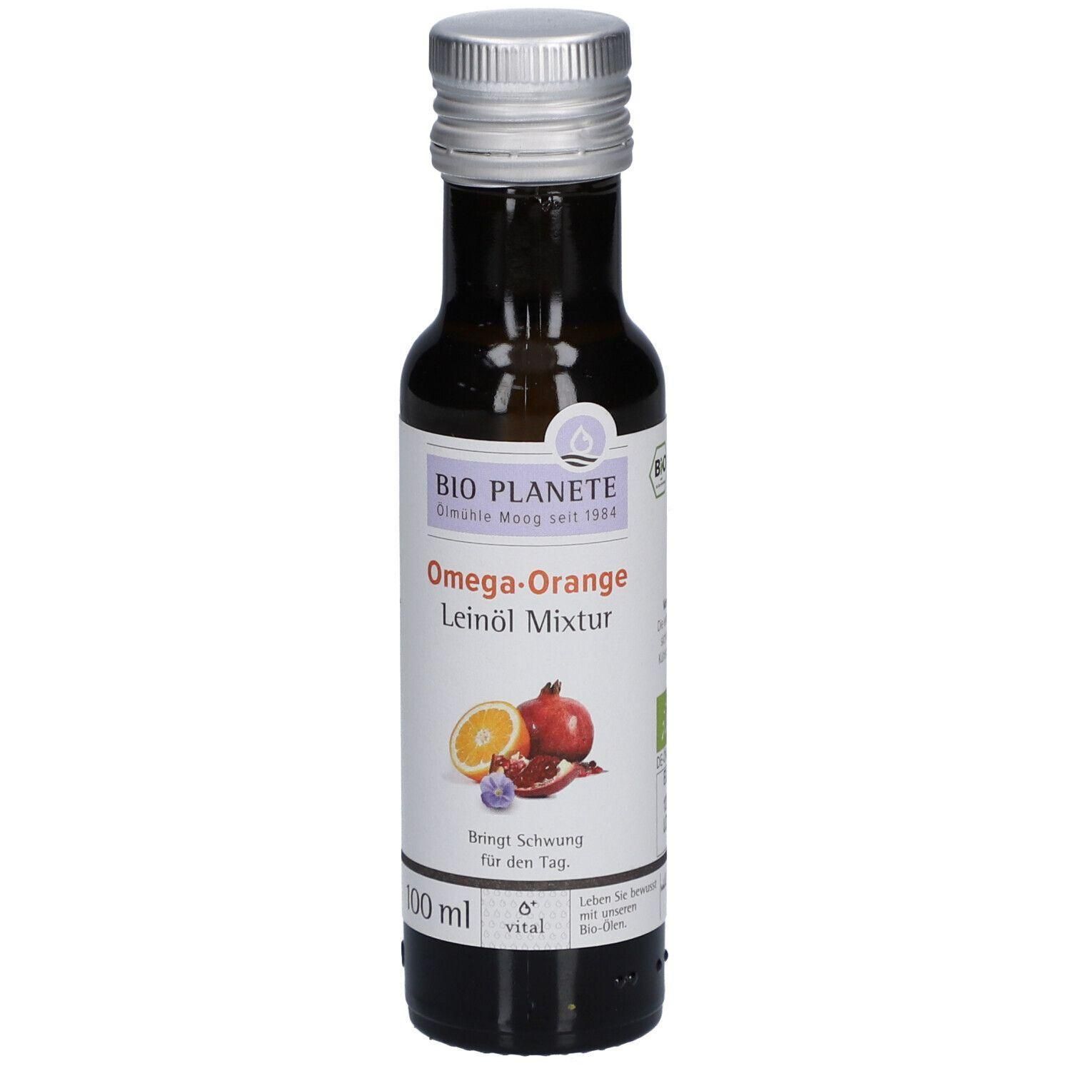 Braune Glasflasche mit silbernem Schraubverschluss. Etikett mit Produktnamen und Abbildung von Orange und Granatapfel. EU Bio-Siegel.