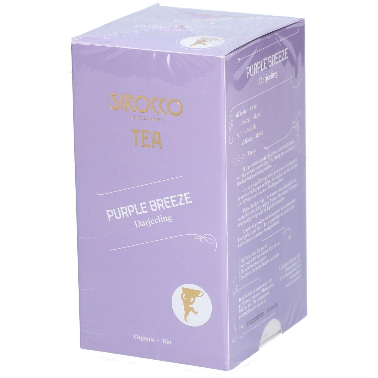Lilafarbene Teebox mit der Aufschrift SIROCCO TEA, Purple Breeze Darjeeling. Verpackung mit Logo und Text.