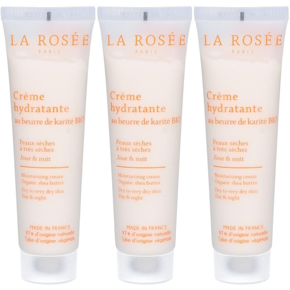 Trois tubes de crème. Inscription "Crème hydratante au beurre de karité BIO".