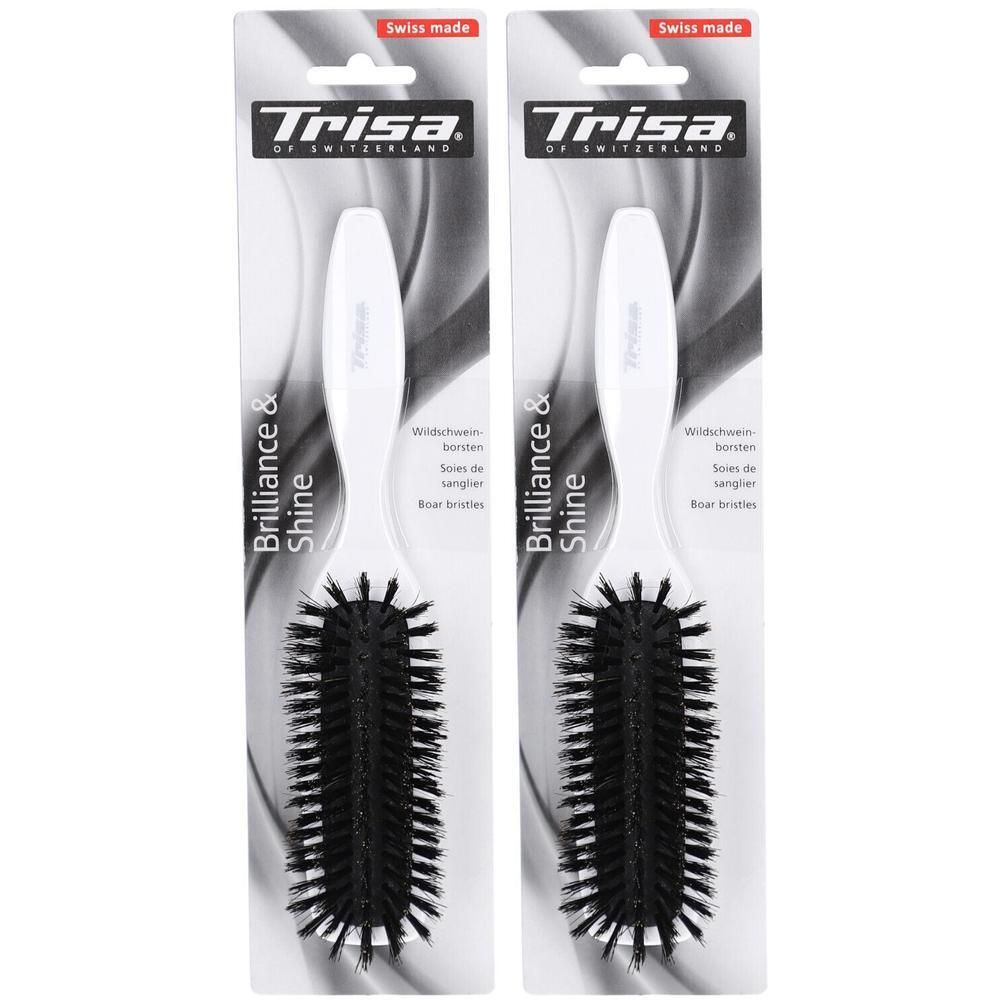 Deux brosses à cheveux Trisa à poils de sanglier, manche blanc, pour brillance et douceur.