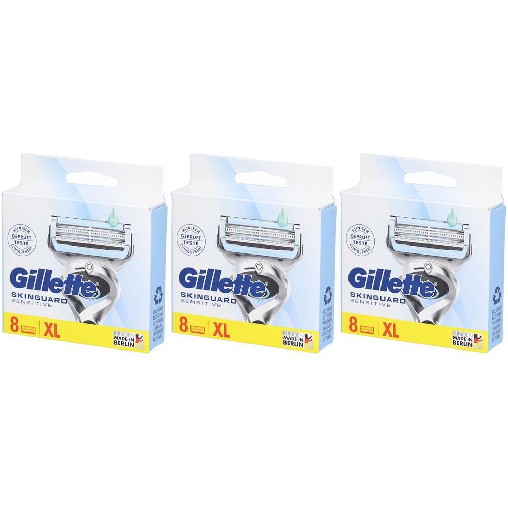 Trois boîtes de lames de rasoir. Chaque boîte montre un rasoir et le texte Gillette SkinGuard Sensitive. Inscription : 8 XL.