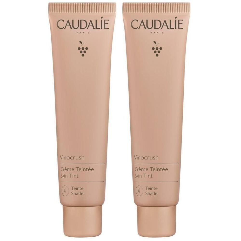 Zwei Tuben mit beigefarbener Creme. Auf jeder Tube steht CAUDALIE, Vinocrush, Crème Teintée, Skin Tint und die Farbnummer 4.