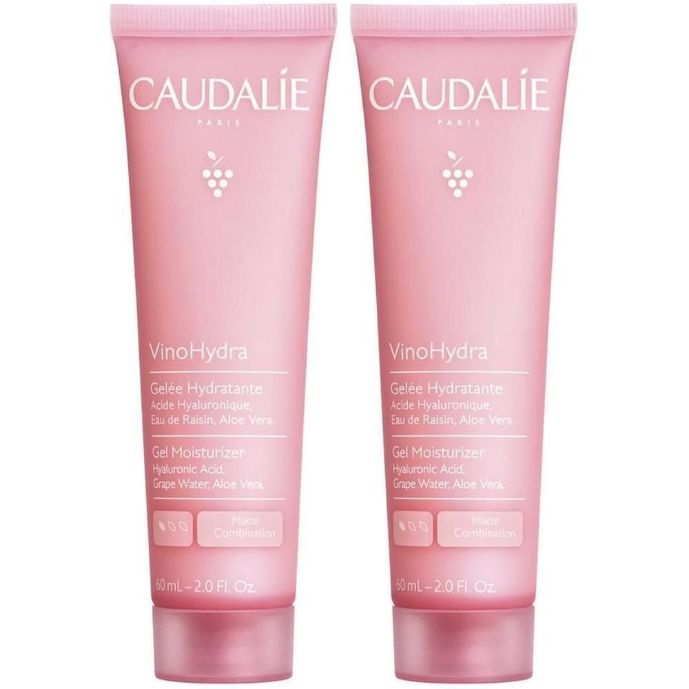 Zwei rosa Tuben mit weißer Schrift. Auf jeder Tube steht "CAUDALIE" und "VinoHydra". Darunter Text in Französisch und Englisch.