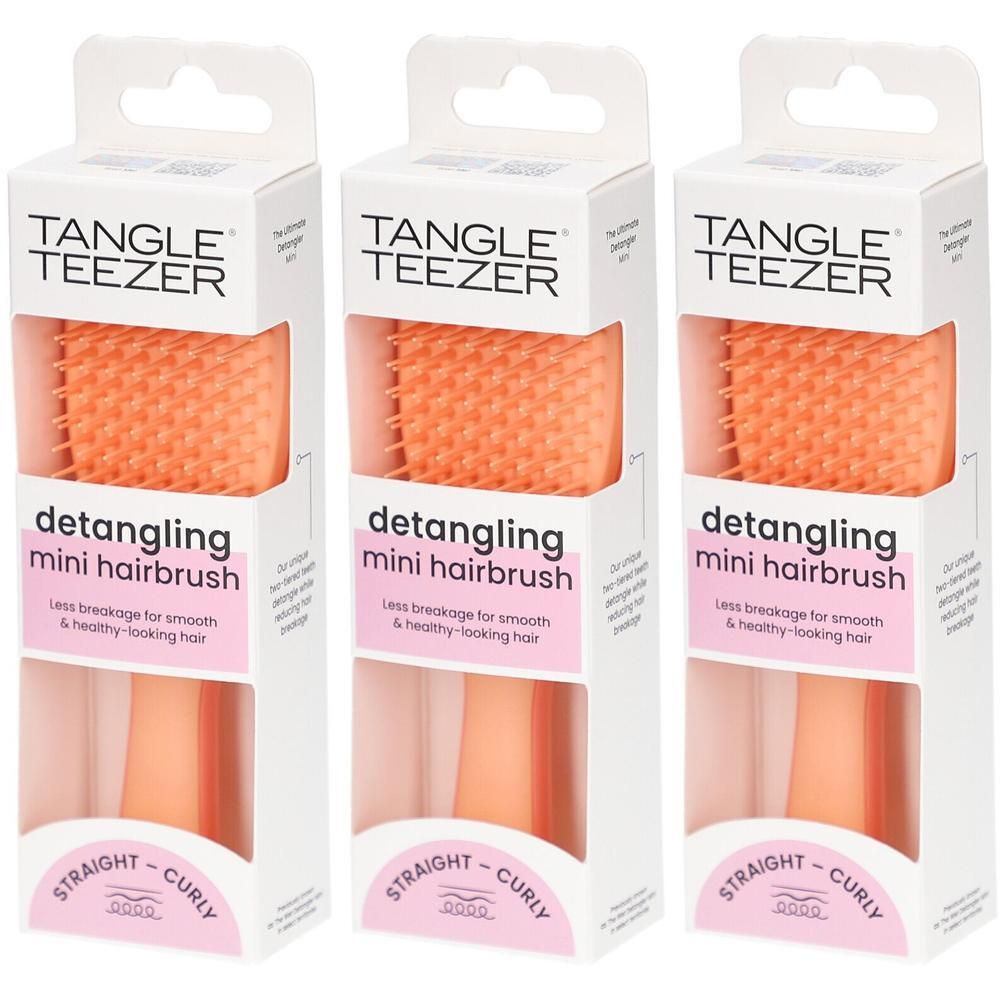Drei Tangle Teezer Mini Entwirrungsbürsten in Orange, verpackt in weißen Kartons.