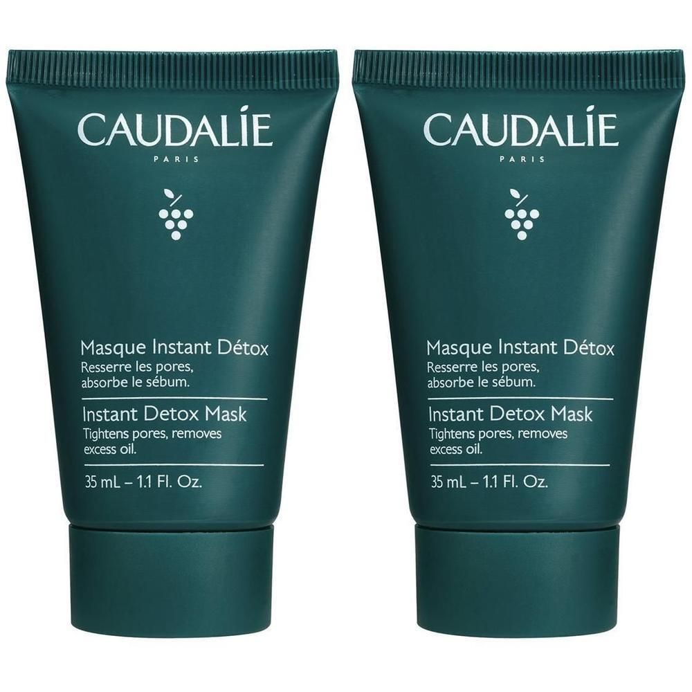 Zwei Tuben Caudalie Masque Instant Détox. Dunkelgrüne Verpackung mit weißem Logo und Produktinformationen. 35 ml.