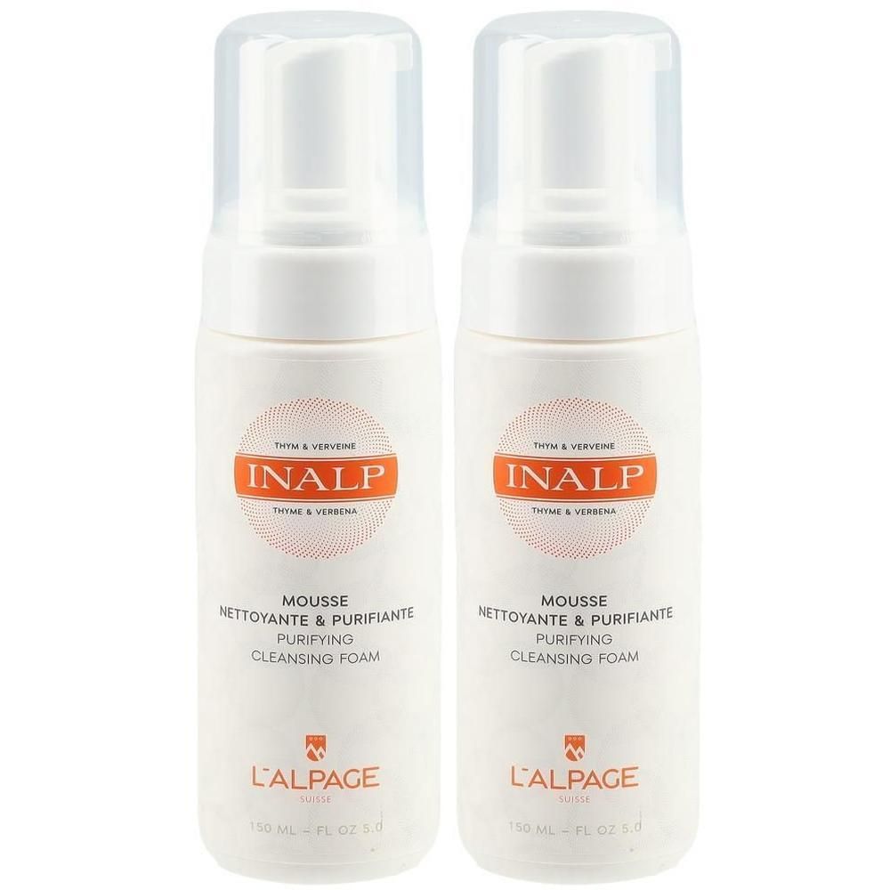Zwei weiße Flaschen L'ALPAGE Reinigungsschaum. Aufschrift INALP, MOUSSE, NETTOYANTE & PURIFIANTE, PURIFYING CLEANSING FOAM.