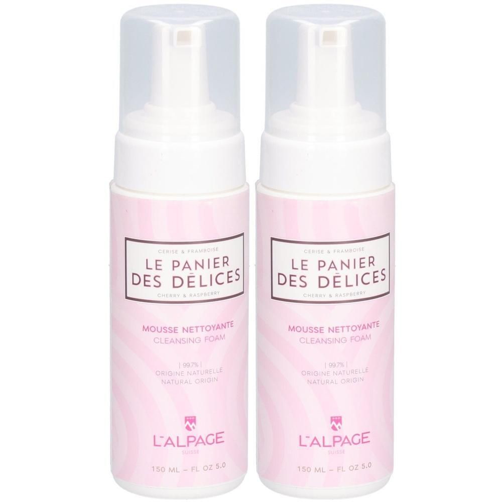 Deux flacons de mousse nettoyante. Design rose et blanc avec texte: LE PANIER DES DELICES, MOUSSE NETTOYANTE, L'ALPAGE. Bouchon transparent.